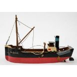 A mid 20th Century wooden clockwork coaster 'Plymouth': black funnel over wheel house,