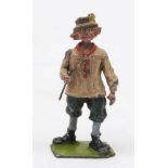 Britains Farm People No 587 'Village Idiot': in beige smock, green trousers and blue stockings.