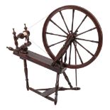 A 19th Century beechwood and fruitwood Saxony pattern spinning wheel: with turned spindle spokes