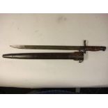 A US Model 1917 bayonet by Remington: the blade stamped as per title,