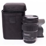 A Sigma 50mm f1.4 DG Art Series lens in original box and bag.