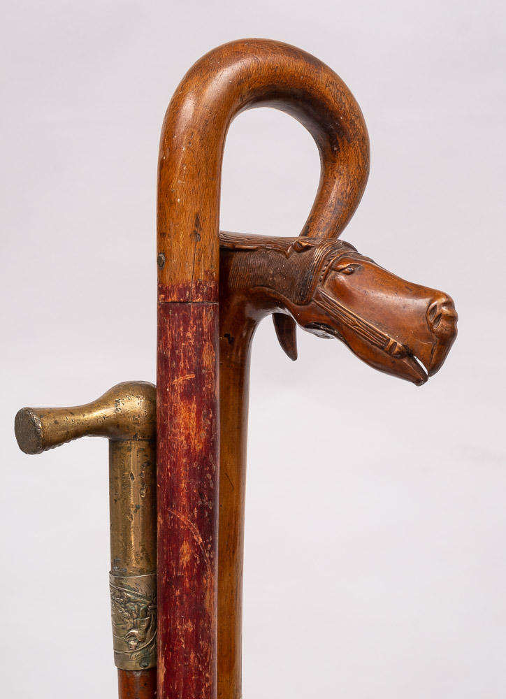 A brass mounted riding crop: together with a Russian carved horse head walking stick and one other - Image 3 of 4