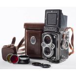 A Rolleiflex twin lens reflex camera: with Carl Zeiss 75mm lens in leather case.