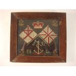 A late 19th/early 20th century sailor's woolwork valentine: with crown over crossed flags and foul