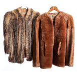 A mid 20th century fur cape by Packards, together with a 1940-50s wool jacket: (2).