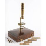 An early 19th century lacquered brass field microscope, unsigned:,