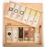 A group of thirteen microscope slides and micro photographs,: comprising;- 'Sturgeon's Tablet,
