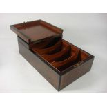 A Victorian walnut stereo box,: the double hinged lid enclosing five fitted compartments,
