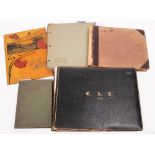 An early 20th century photograph album circa 1913: with family portraits,