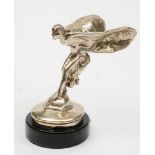 A Rolls-Royce Spirit of Ecstasy radiator mascot, mounted on a marble socle, 15cm high.