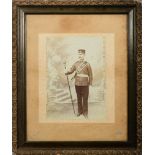 A collection of late 19th/early 20th century framed regimental photographs and portrait