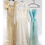 A 1970s white silk floral pattern wedding dress: together with a white nylon wedding dress and an