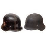 A M1934 pattern German helmet and an M42 pattern helmet: (2)