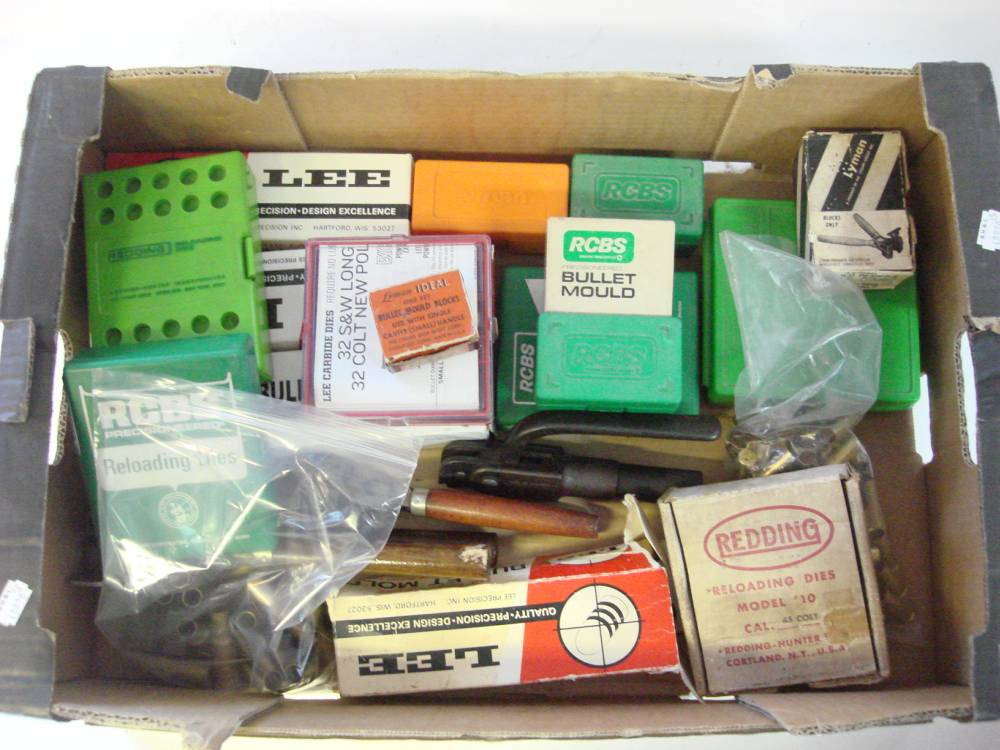 A quantity of various reloading equipment including bullet moulds etc.