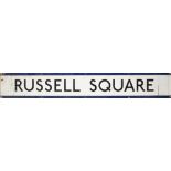 A London Underground enamel frieze sign 'Russell Square' by Garnier: 23 x 150cm.