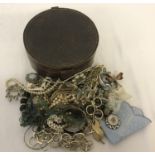 A vintage leather collar box containing a quantity of assorted costume jewellery.