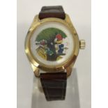 A vintage Woody Woodpecker wristwatch with rocking Woody detail to watch face.