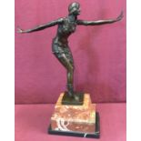 An Art Deco style bronze figurine of an Arabian style dancer.