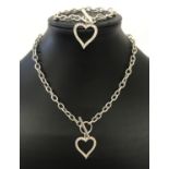 A matching belcher chain with t bar fixing and dangle heart necklace and bracelet.