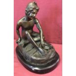 A bronze sculpture of The Neapolitan Fisherboy, mounted on oval shaped marble base.