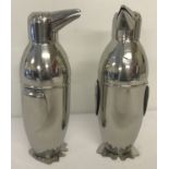 2 novelty penguin shaped cocktail shakers.