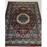 A red ground vintage Oriental style rug with floral design and tasselled ends. In as new condition.
