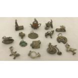 15 vintage silver and white metal charms.