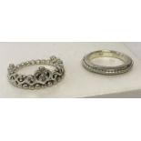 A silver Pandora stacking ring with beaded design together with a silver tiara style stone set ring.