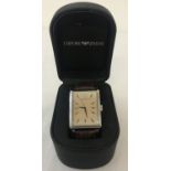 A boxed Emporio Armani men's wristwatch with brown leather strap.