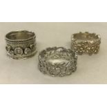 3 decorative band style dress rings.