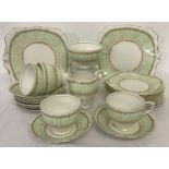 A vintage hand painted Art Deco style part tea set in mint & tan colourway.