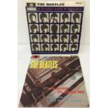 2 vintage Beatles vinyl LP's, Please Please Me together with A Hard Day's Night.