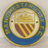 A painted cast metal Manchester City Football Club, wall hanging plaque.