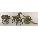 Three items of vintage brassware, comprising a pony & trap; a cannon and a brass foal.