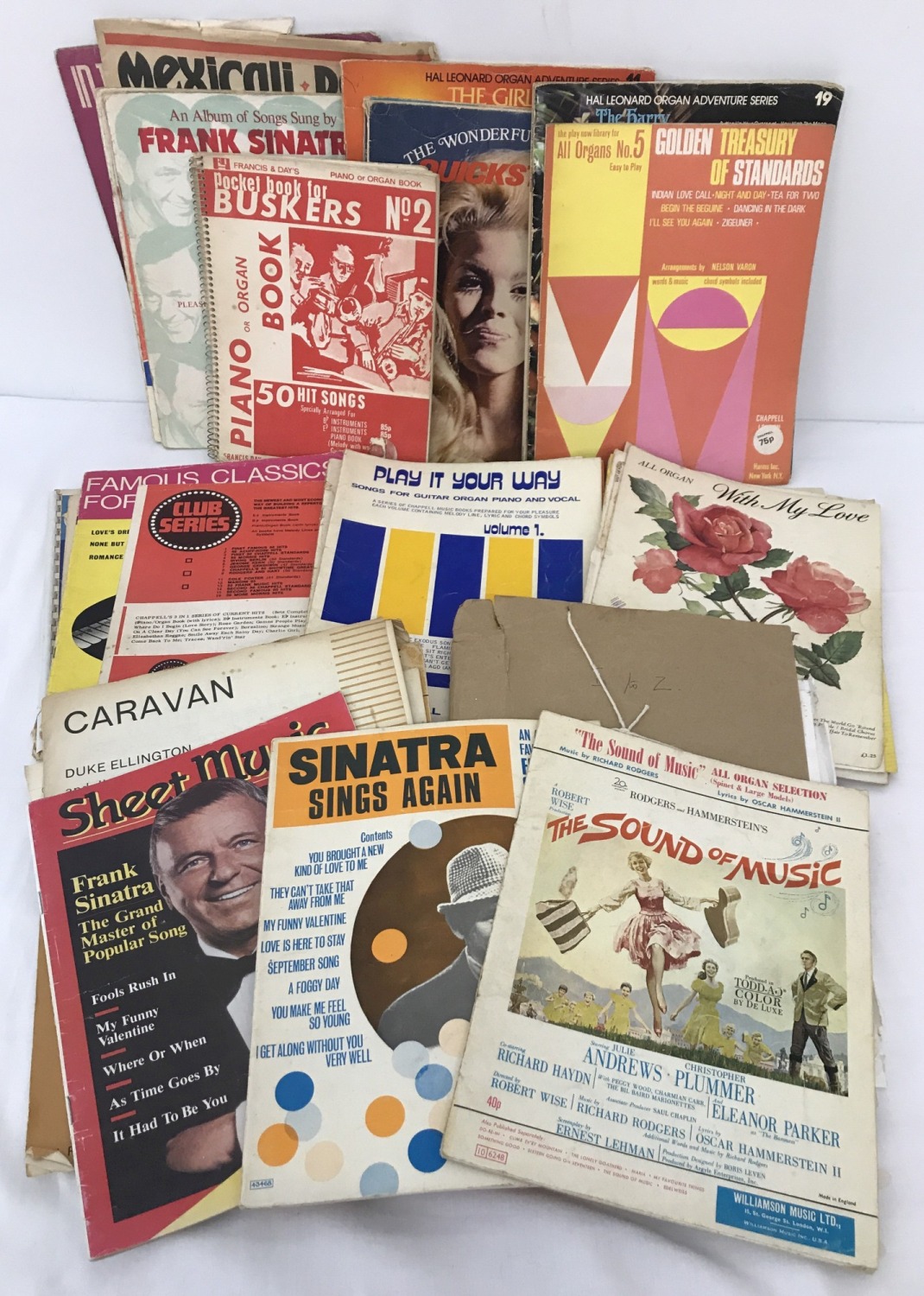 A quantity of vintage sheet music and music books.