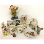 A collection of children's cartoon character ceramics.