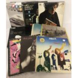 A collection of assorted vintage vinyl LP's to include: Abba, Paul McCartney and Shirley Bassey.