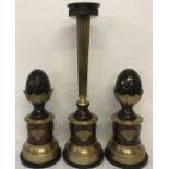 A 3 piece vintage metal candle stand garniture on marble bases, with acorn detail.