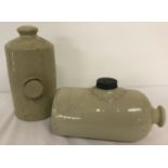 Two stoneware hot water bottles.