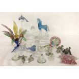 A collection of miniature glass animals.