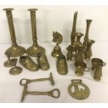 A box of assorted brass ornaments to include 2 pairs of candlesticks.