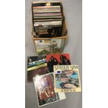 A box of assorted vintage vinyl LP's.