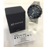 A boxed men's "Ediface" Chronograph watch by Casio. Blue/black face with silver tone bracelet strap.