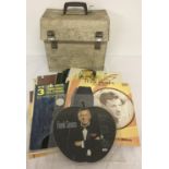 A vintage white record case containing 30 assorted Frank Sinatra records.