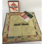 A complete 1940s game of Monopoly.