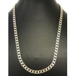 A silver curb chain with lobster clasp. Makers mark, scales mark and 925 to clasp and fixings.