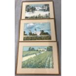 A set of three framed and glazed coloured prints of French chateaux.