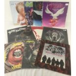 10 rock and heavy metal music LP records.