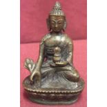 A small Chinese bronze Buddha figure.
