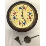 A wooden cased wall hanging fusee clock with bevel edged glass.